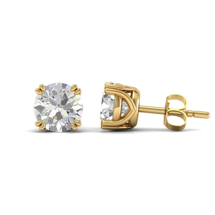 Vintage double prong Diamond stud earrings in 18K yellow gold