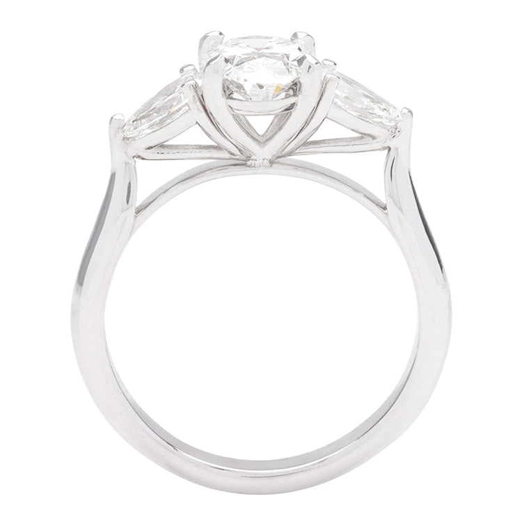 Oval Shaped Center Flanked By 2 Pear Shaped Diamonds in a Petit 14K White Gold Setting; 0.50 Ctw